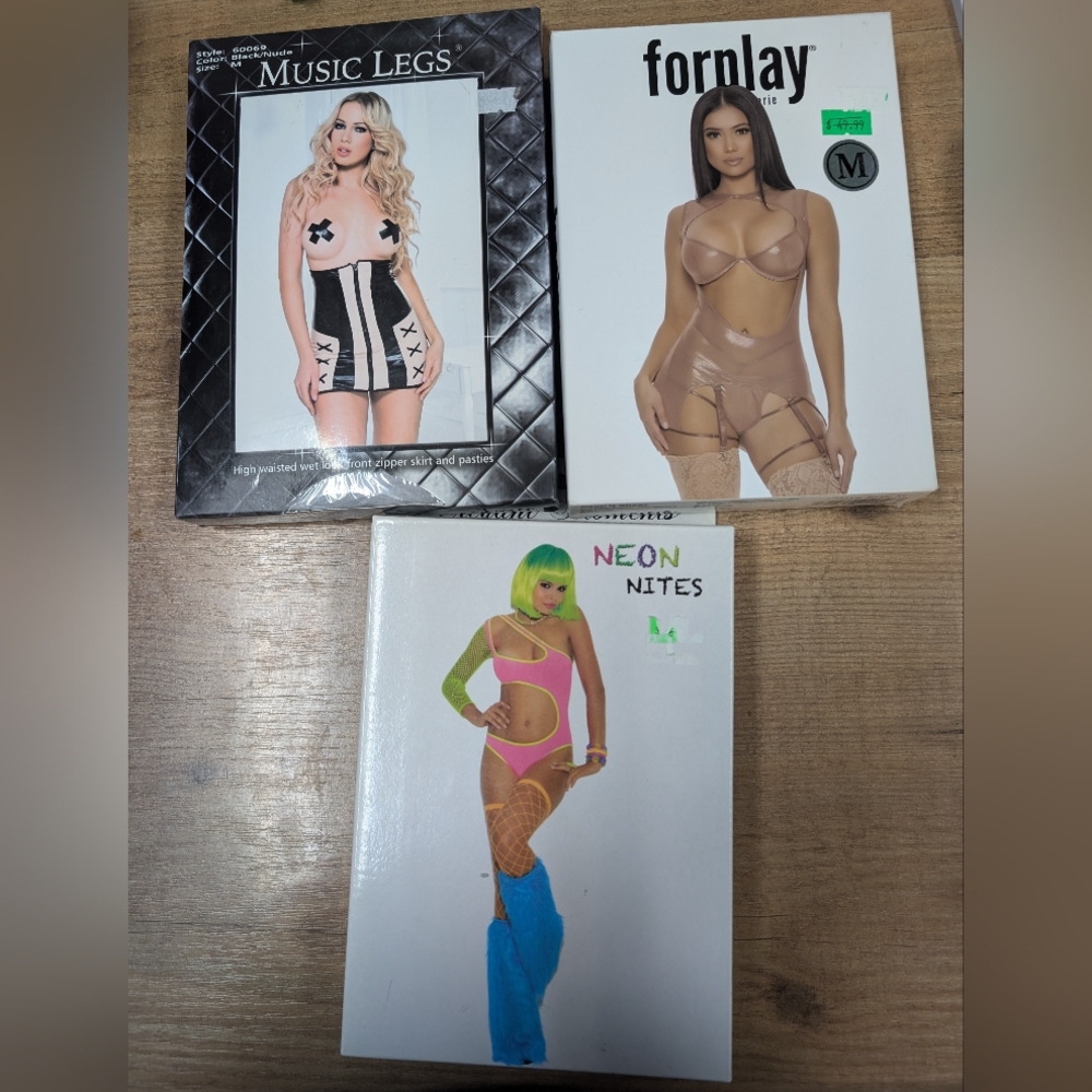 Three Packaged Lingerie Outfits.